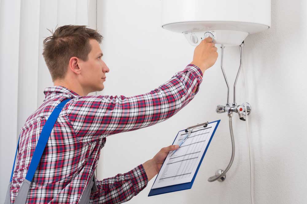 plumber checking water heater